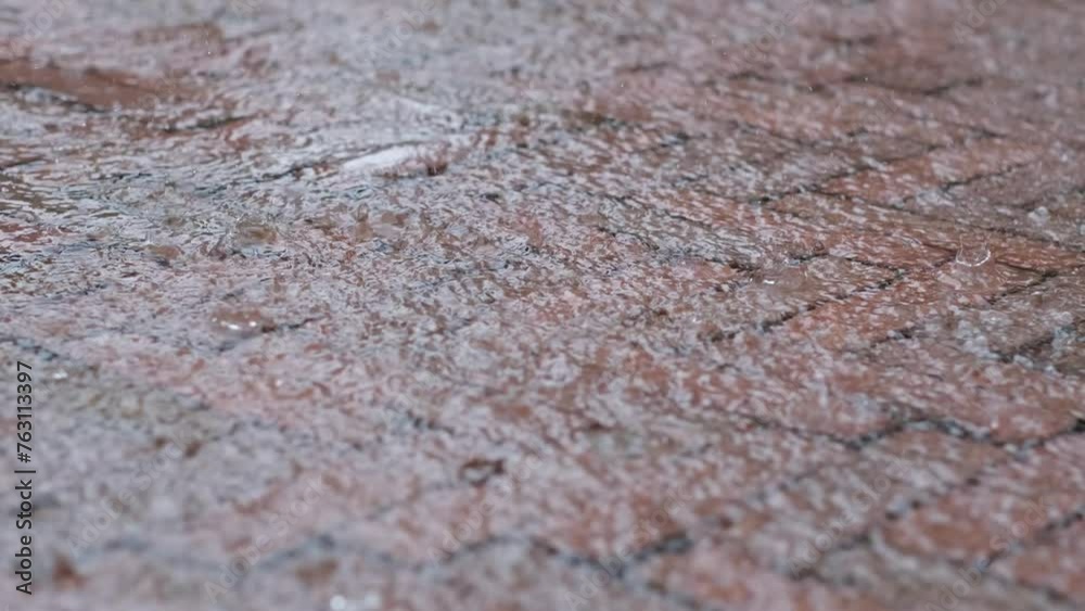 Raindrops on the ground. Abstract rain drops background Raindrops on the ground. Abstract rain drops background