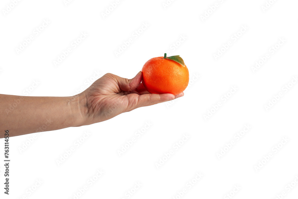 Orange fruit in hand isolated on transparent background. Orange fruit in hand isolated on transparent background.