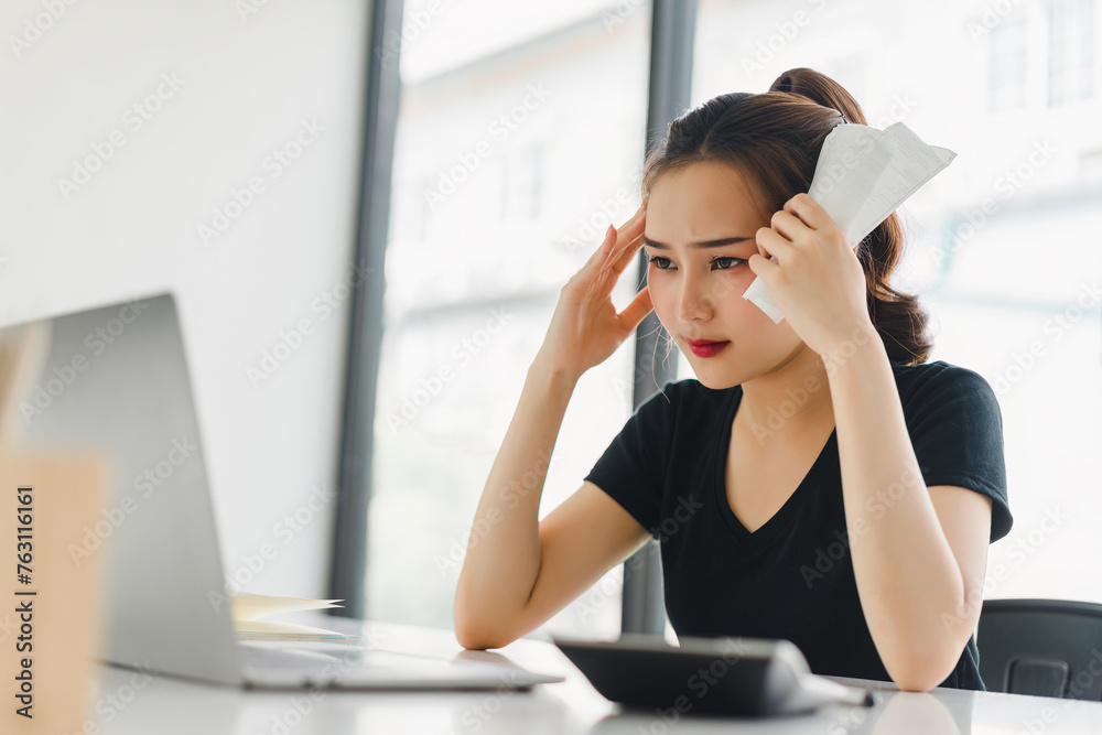 Stressed Young Woman with Calculator and Receipt. Stressed Young Woman with Calculator and Receipt.