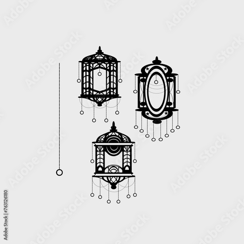 Shape Of Lantern: Black color lantern shape  decorated with chain, circle, and shapes isolated on white background.Shapes cutting work. photo