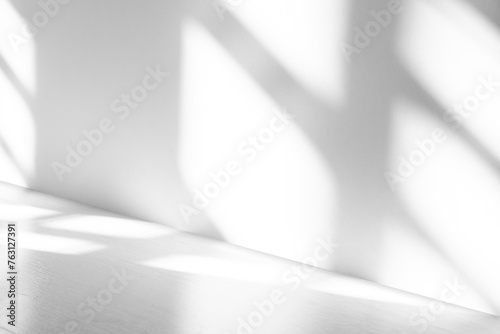 Wall interior background, studio and backdrops show products.with shadow from window color white and grey. background for text insertion and presentation product	