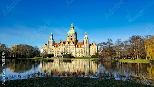 Hanover Maschpark new town hall with beautiful tree reflection in the lake water photo