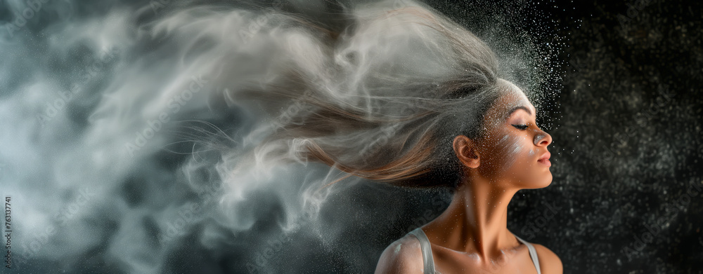 Profile of woman with flowing hair and white powder in wind, artistic concept. Profile of woman with flowing hair and white powder in wind, artistic concept.
