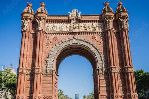 Arc de Triomf triumphal arch on promenade of the Passeig de Lluis Companys in Barcelona city, Spain photo