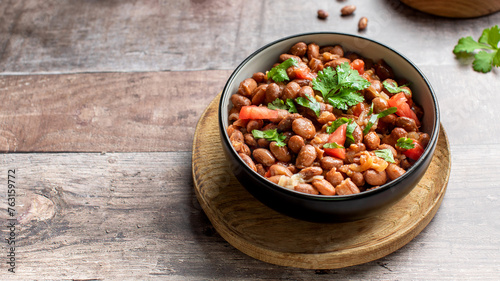  Vegetarian dish of stewed pink beans and tomatoes. A delicious bean dish served 