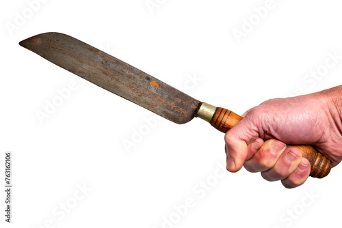 Hand holding a rusty butcher knife photo