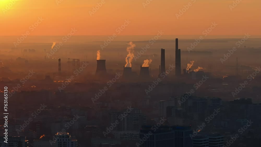 Aerial drone view of thermal power stations in Bucharest at sunset. Flying birds. Romania Aerial drone view of thermal power stations in Bucharest at sunset. Flying birds. Romania