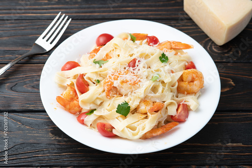 Italian pasta with shrimps , parmesan and tomatoes