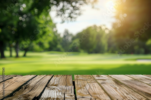 Wooden table in front of golf course with bokeh background