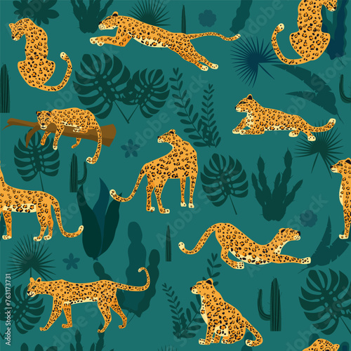 Leopard seamless pattern with tropical leaves © hadeev