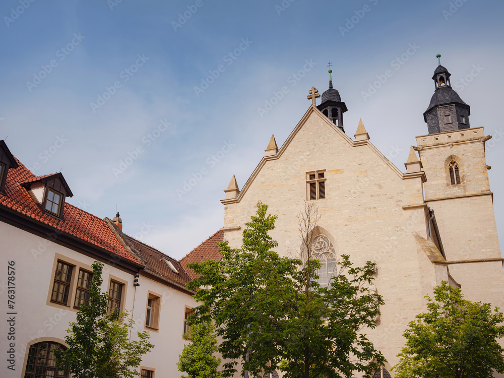 spring trip to Europe. Travel and German sightseeing locations. interesting ancient towers and facades of medieval houses somewhere in Erfurt city