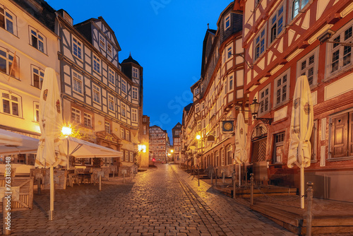 Night medieval street with traditional half-timbered houses, Marburg an der Lahn, Hesse, Germany © Kavalenkava