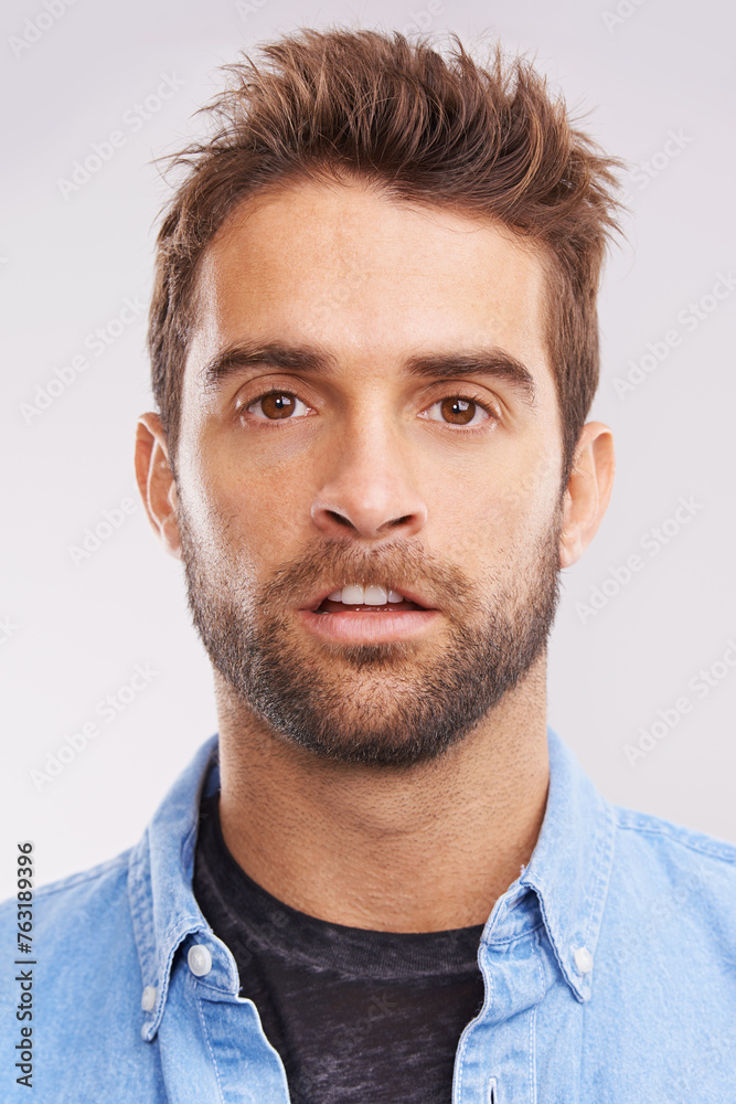 Obraz premium Portrait, rabbit face and man with expression, reaction and teeth on a grey studio background. Person, model and guy with Easter holiday and bunny with character and casual with humor, joy and funny