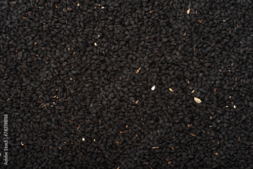Full frame of black sesame seeds as background or texture.