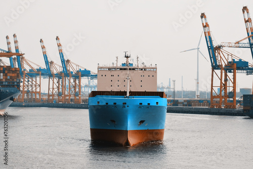 Container Freight Cargo Ship Vessel Underway Leaving The Port In Ballast Condition photo