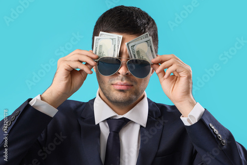 Young businessman in sungla...