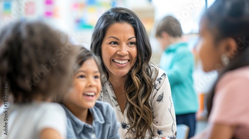 Joyful Female Teacher Interacting with Diverse Young Students.