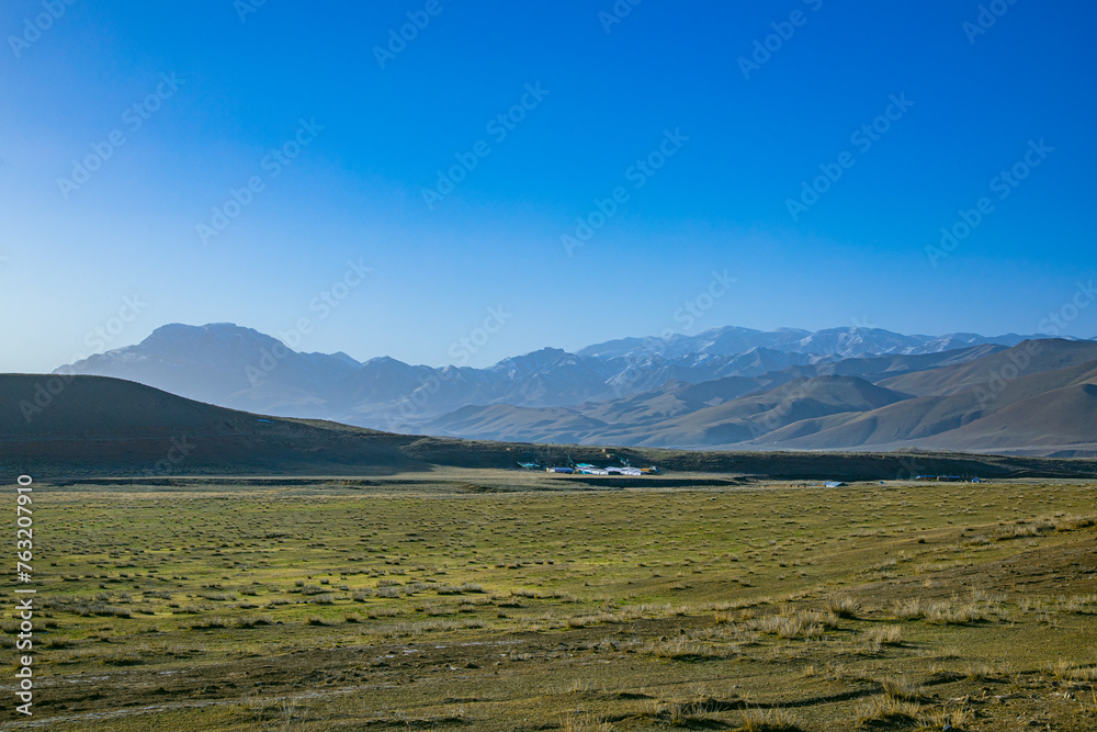 Aba Qiang and Tibetan Autonomous Prefecture, Sichuan Province - mountains and grassland scenery under the blue sky Aba Qiang and Tibetan Autonomous Prefecture, Sichuan Province - mountains and grassland scenery under the blue sky