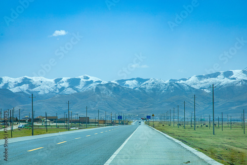 Aba Qiang and Tibetan Autonomous Prefecture, Sichuan Province - mountains and grassland scenery under the blue sky photo