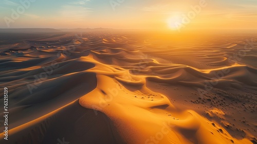 Sun Setting Over Desert With Sand Dunes