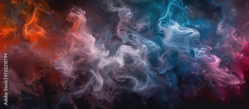 A close up of vibrant violet, magenta, and electric blue smoke swirling in space, creating an artistic display on a dark background