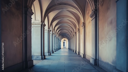 A symmetrical row of arches in a historic building  creating a captivating vanishing point within the architecture