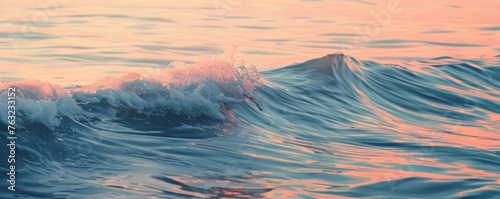 Gentle ocean wave at sunset