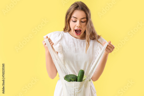 Surprised young woman with ...