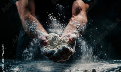 close-up hands holding flour, cook preparing to bake, kitchen 