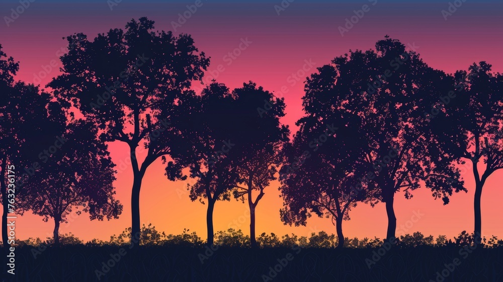 Silhouette of trees against colorful sunset sky