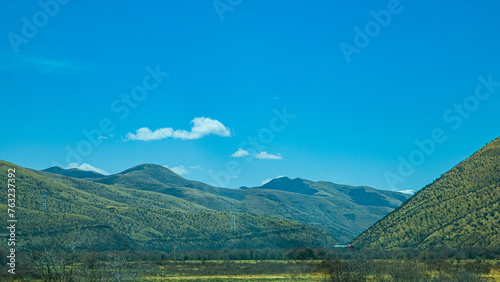 Fototapeta Naklejka Na Ścianę i Meble -  Aba Qiang and Tibetan Autonomous Prefecture, Sichuan Province - mountains and grassland scenery under the blue sky
