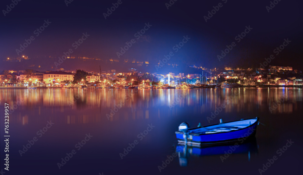 Resort town of Fethiye city lights reflection on the water with lot of boat -  Fethiye, Turkey