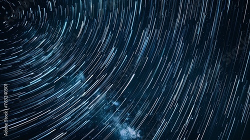 Long exposure of star trails in the night sky photo