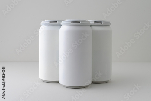 Matte four-pack, aluminum can mockup. White drink can. Pop, soda, beer, soft drink. (real photo shoot). 3D, Realistic.  (ID: 763240540)