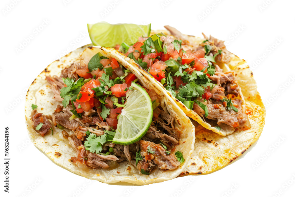 top view of carnitas tacos, featuring slow-cooked pork, salsa, cilantro, and lime wedges, served on corn tortillas.