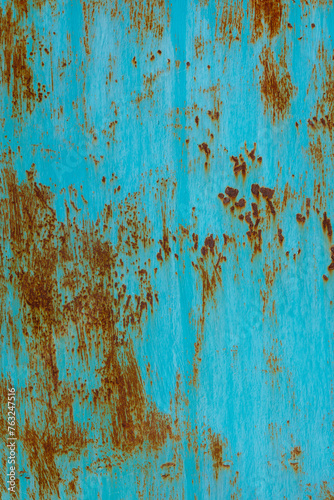 turquoise painted steel surface with stains of rust - full-frame background and texture.