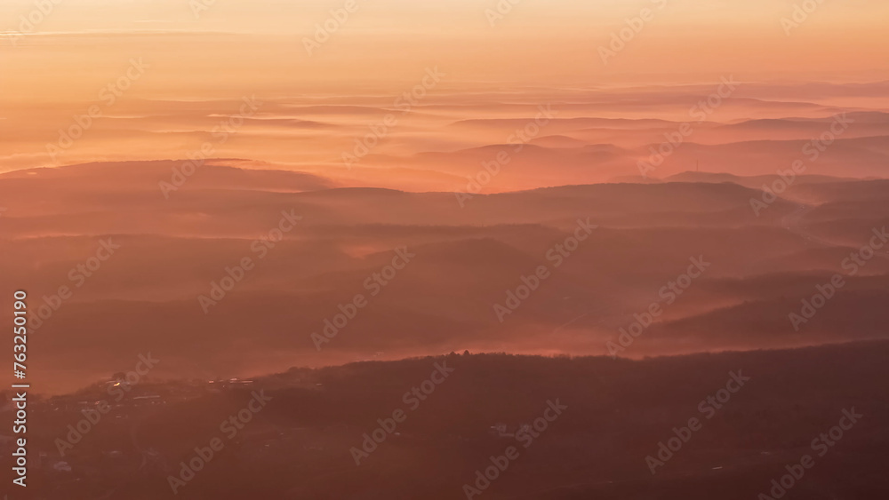 Aerial view of vehicles passing over Istanbul Yavuz Sultan Selim Bridge in sunrise light ships passing under it to enter the Bosphorus and its surroundings