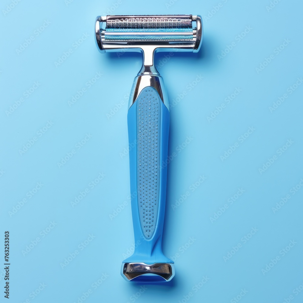 Obraz premium Blue Pivoting Shaving Razor Isolated on White. Perfect for Daily Grooming for Men