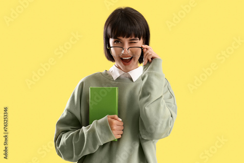 Happy young woman in eyegla...