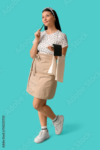 Thoughtful young waitress w...