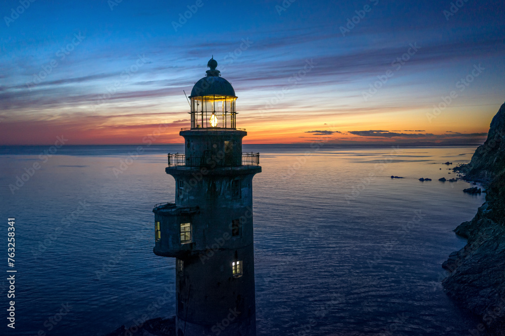Aerial view of Aniva Lighthouse on the rugged coast of Sakhalin Island, Sakhalin Oblast, Russia. Aerial view of Aniva Lighthouse on the rugged coast of Sakhalin Island, Sakhalin Oblast, Russia.