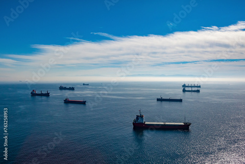 Aerial view of cargo ships anchored in the Marmara Sea waiting to enter the Bosphorus, Istanbul, Turkey. photo