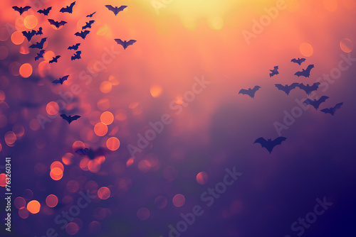 halloween, chauve-souris noires volant sur un fond festif violet et orange avec espace négatif copy space photo