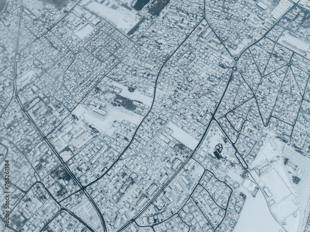 Aerial view of falling snow in the residential area Kingersheim, Mulhouse, Alsace, France. Aerial view of falling snow in the residential area Kingersheim, Mulhouse, Alsace, France.