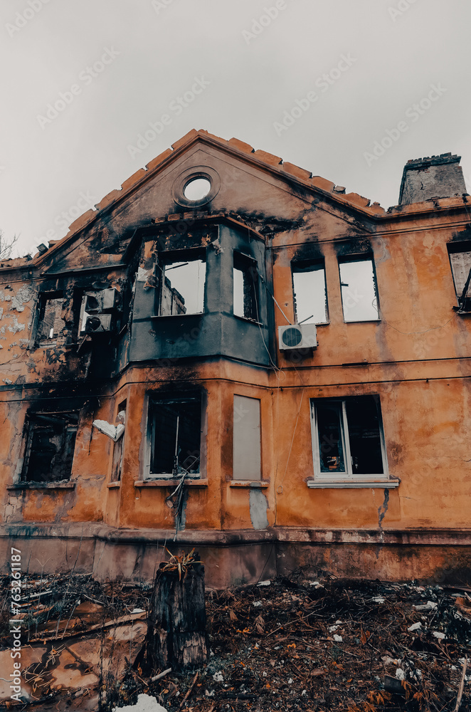 destroyed and burned houses in the city during the war in Ukraine