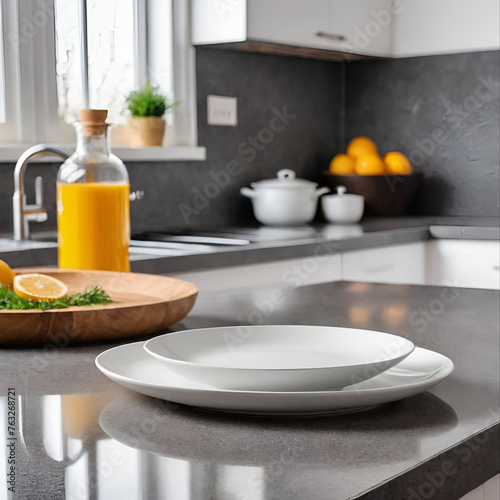 An empty plate for your product or dish on the kitchen countertop in a bright modern kitchen.