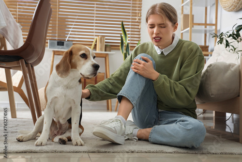 Young woman with dog trauma...