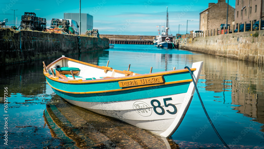 Naklejka premium Boat in a harbour 