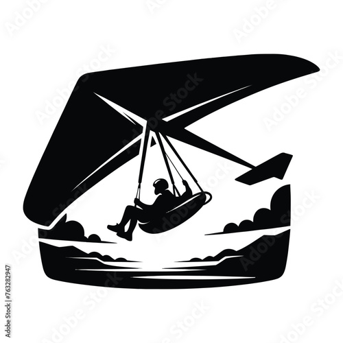 Hang Glider Soaring Above the Coastline