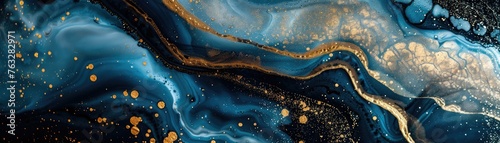 A fluid art background with marbling effect in shades of blue and gold,
